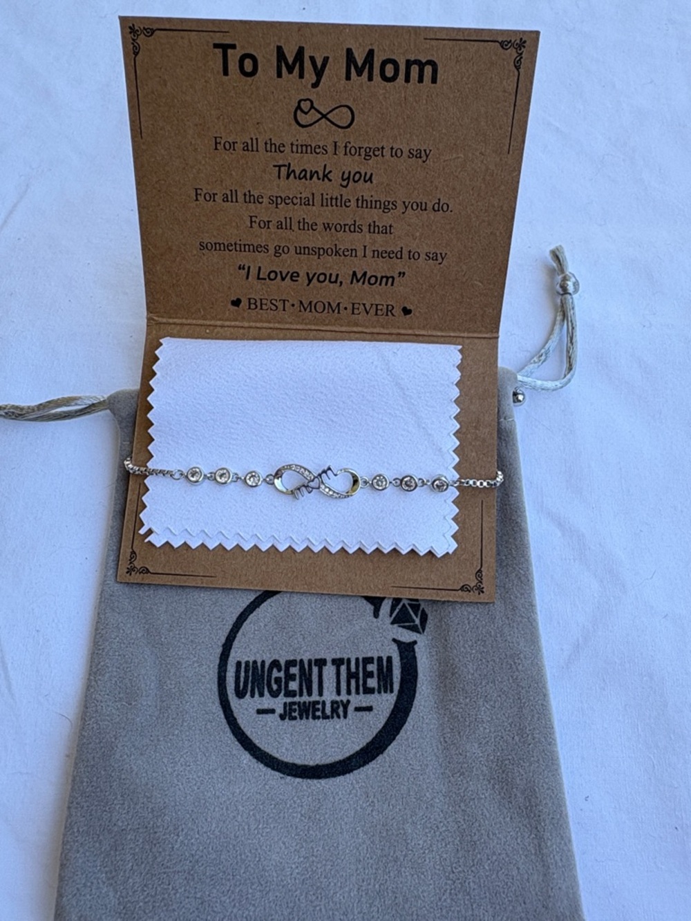 NWOT Silver Infinity “Mom” Bolo Bracelet with Rhinestone Accents